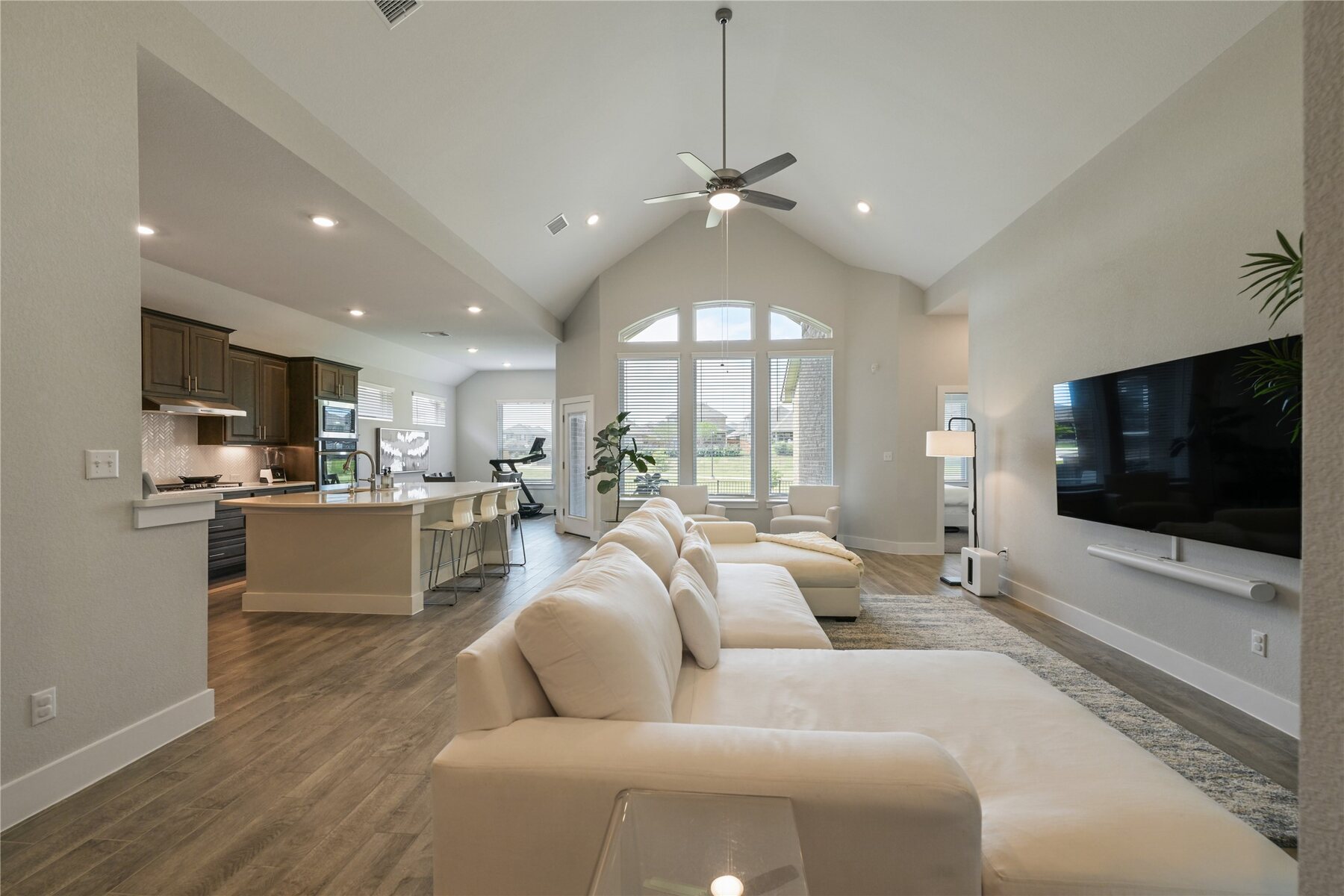 Vaulted open living area at 238 Wild Pecan Loop