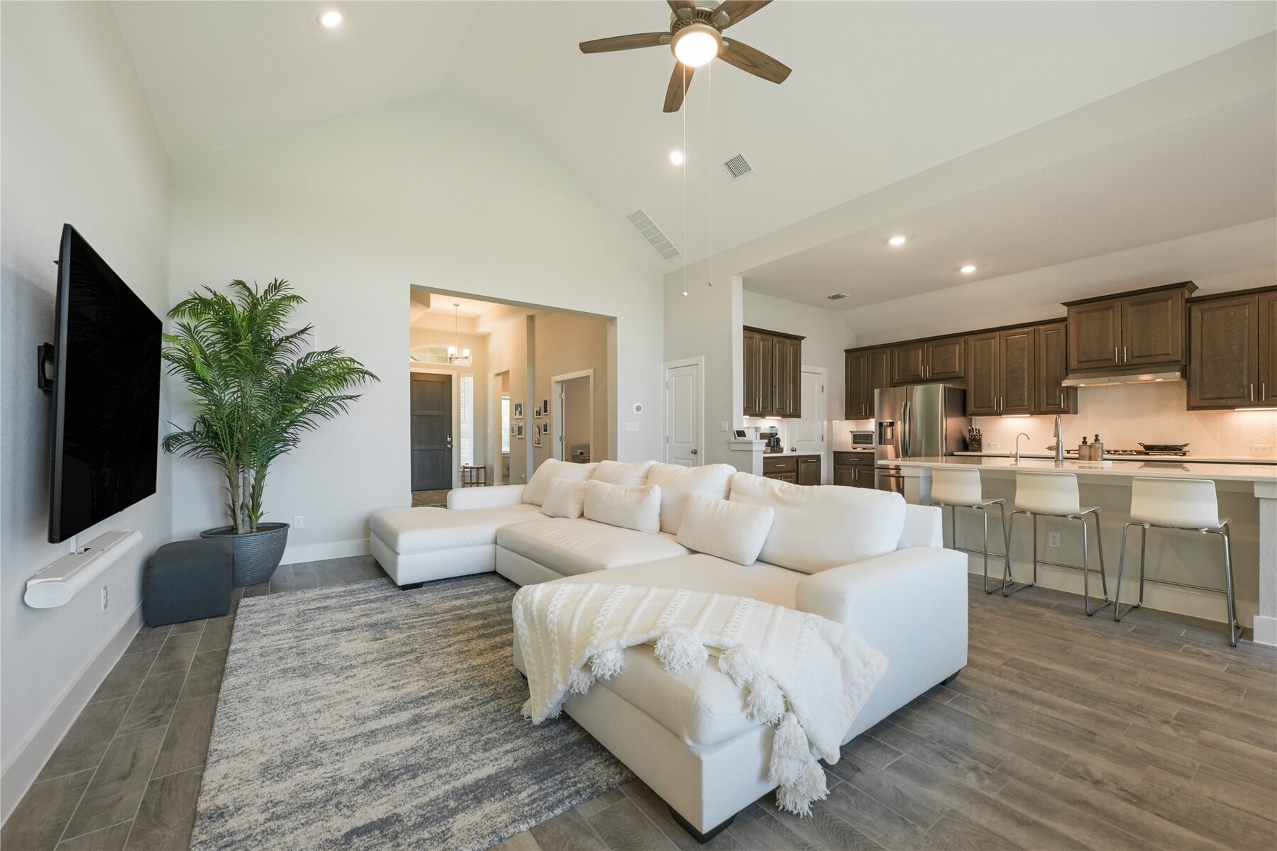 Open living and kitchen layout at 238 Wild Pecan Loop